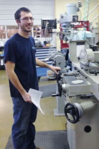 Chris LaBranche enjoys the precision work he does as a tooling technician at Dymotek. 