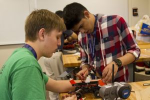 High school students use 3-D modeling and other technologies to create solar-powered vehicles capable of crossing obstacle courses during the 2015 Career Pathways summer workshops on alternative energy at Seminole State College. 