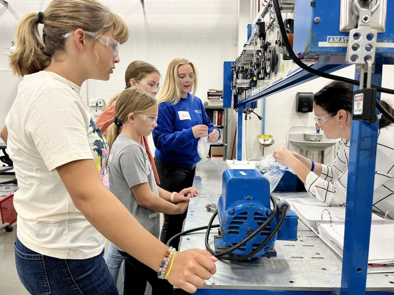 group of girls work on hands-on activity