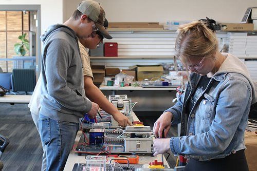 Students working on equipment