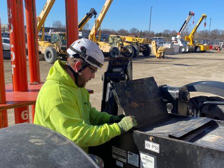 Will Cummings, a journeyman ironworker and welding foreman at The Boldt Company, wears one of the new safety helmets. Ph